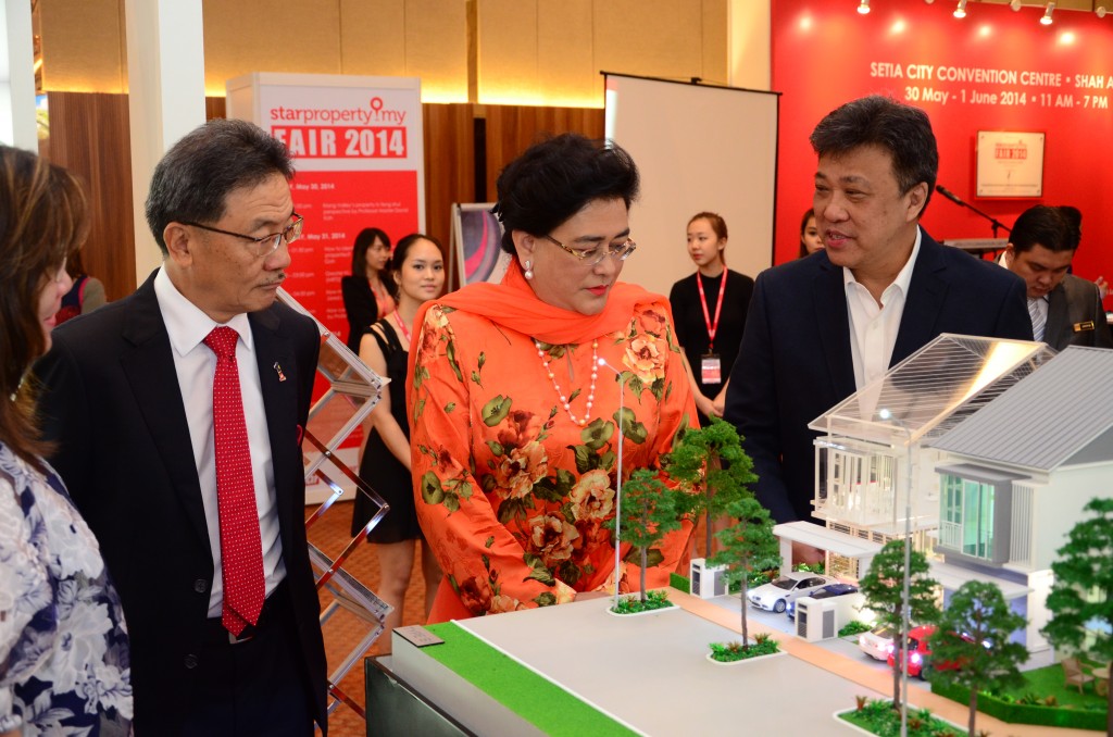 (From left) Real Estate & Housing Development Association president Datuk Seri Michael Yam, Ministry of Urban Wellbeing, Housing and Local Government deputy minister Datuk halimah Mohamed Sadique and Star Publications Berhad group chief executive officer Datuk Seri Wong Chun Wai visiting one of the 30 exhibition booths in the StarProperty Fair 2014 launch at Setia City Convention Centre